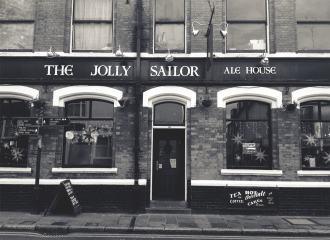 Old fashioned English style pub, black and white photo